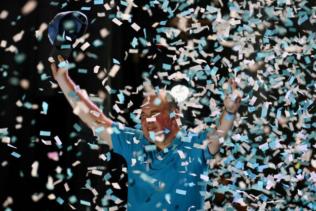 Peru's presidential candidate Rafael Lopez Aliaga, for the Renovacion Popular party, greets supporters during his closing campaign rally in Lima on April 9, 2026. Peru will hold presidential elections on April 12. (Photo by Luis ROBAYO / AFP)