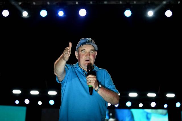 Peru's presidential candidate Rafael Lopez Aliaga, for the Renovacion Popular party, speaks to supporters during his closing campaign rally in Lima on April 9, 2026. Peru will hold presidential elections on April 12. (Photo by Luis ROBAYO / AFP)