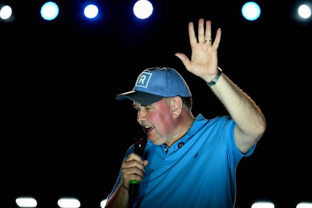 Peru's presidential candidate Rafael Lopez Aliaga, for the Renovacion Popular party, speaks to supporters during his closing campaign rally in Lima on April 9, 2026. Peru will hold presidential elections on April 12. (Photo by Luis ROBAYO / AFP)