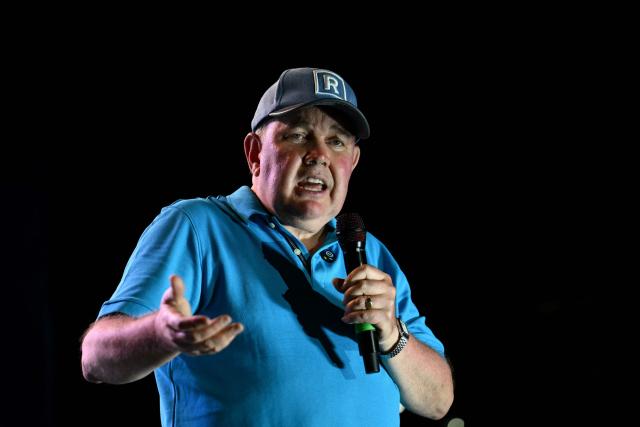 Peru's presidential candidate Rafael Lopez Aliaga, for the Renovacion Popular party, speaks to supporters during his closing campaign rally in Lima on April 9, 2026. Peru will hold presidential elections on April 12. (Photo by Luis ROBAYO / AFP)