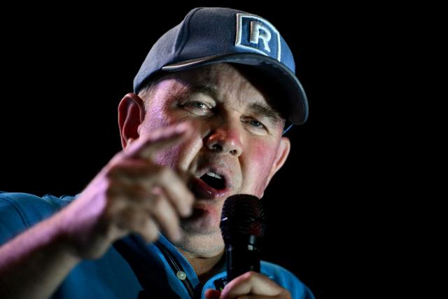 Peru's presidential candidate Rafael Lopez Aliaga, for the Renovacion Popular party, speaks to supporters during his closing campaign rally in Lima on April 9, 2026. Peru will hold presidential elections on April 12. (Photo by Luis ROBAYO / AFP)