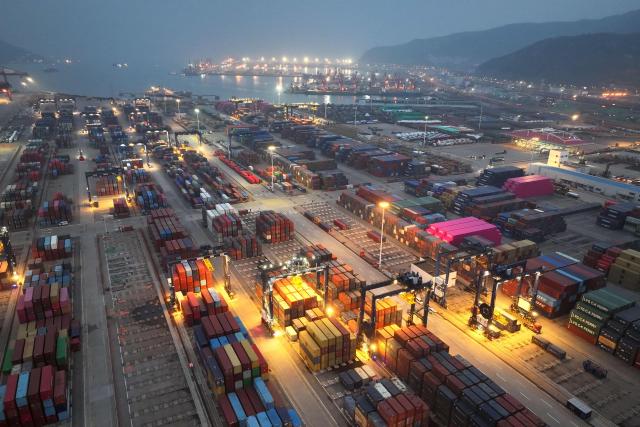This aerial photo taken on April 9, 2026 shows a view of a port in Lianyungang, China's Jiangsu province. (Photo by CN-STR / AFP) / China OUT