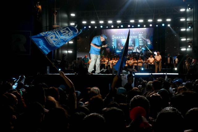 Peru's presidential candidate Rafael Lopez Aliaga, for the Renovacion Popular party, speaks to supporters during his closing campaign rally in Lima on April 9, 2026. Peru will hold presidential elections on April 12. (Photo by Luis ROBAYO / AFP)