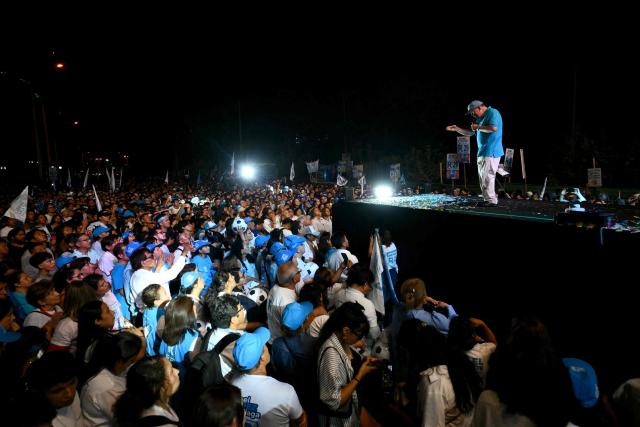 Peru's presidential candidate Rafael Lopez Aliaga, for the Renovacion Popular party, speaks to supporters during his closing campaign rally in Lima on April 9, 2026. Peru will hold presidential elections on April 12. (Photo by Luis ROBAYO / AFP)