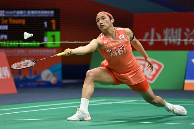 South Korea's An Se Young hits a return to Japan's Tomoka Miyazaki during their women's singles quarter-final match at the Badminton Asia Championships in Ningbo, eastern China's Zhejiang province on April 10, 2026. (Photo by CN-STR / AFP) / China OUT