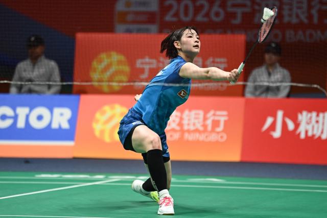Japan's Tomoka Miyazaki hits a return to South Korea's An Se Young during their women's singles quarter-final match at the Badminton Asia Championships in Ningbo, eastern China's Zhejiang province on April 10, 2026. (Photo by CN-STR / AFP) / China OUT