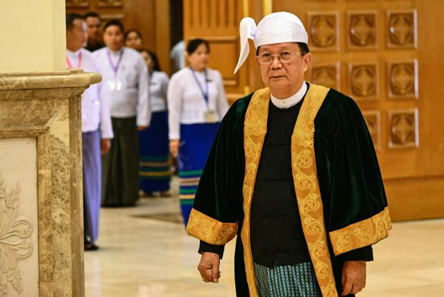 Former general and speaker elected of the Amyotha Hluttaw (Upper House of Parliament) Aung Lin Dwe arrives
to attend the sworn-in ceremony for Myanmar president during a session of the Pyidaungsu Hluttaw (Union Parliament) in Naypyidaw on April 10, 2026.. Myanmar junta chief Min Aung Hlaing was sworn in as president on April 10, 2026, AFP journalists saw, continuing his rule from a civilian post five years after snatching power in a coup. (Photo by Sai Aung MAIN / AFP)