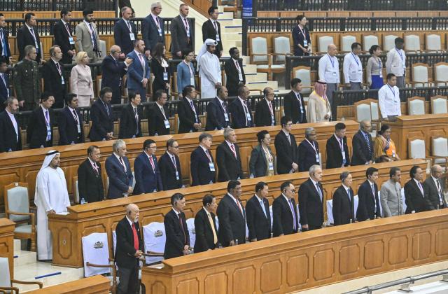 Foreign delegation officials attend the sworn-in ceremony for Myanmar president during a session of the Pyidaungsu Hluttaw (Union Parliament) in Naypyidaw on April 10, 2026. Myanmar junta chief Min Aung Hlaing was sworn in as president on April 10, 2026, AFP journalists saw, continuing his rule from a civilian post five years after snatching power in a coup. (Photo by Sai Aung MAIN / AFP)