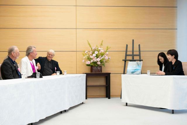 Japan’s Prime Minister Sanae Takaichi (R), members of British rock band Deep Purple (L-R) Roger Glover, Ian Gillan and Ian Paice attends a meeting at the Prime Minister's Office in Tokyo on April 10, 2026. (Photo by Yuichi YAMAZAKI / POOL / AFP)