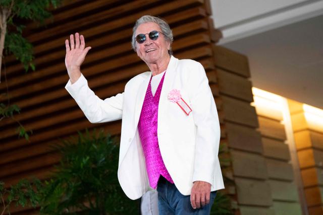 A member of British rock band Deep Purple Ian Gillanat leaves after a meeting with Japan’s Prime Minister Sanae Takaichi the Prime Minister's Office in Tokyo on April 10, 2026. (Photo by Yuichi YAMAZAKI / POOL / AFP)