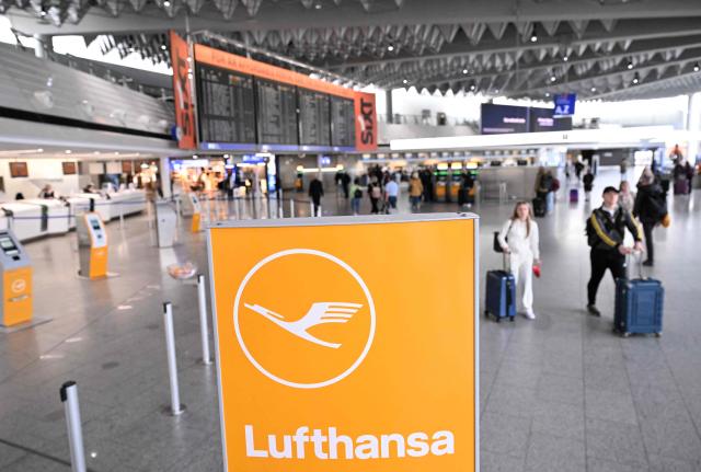 The check-in area of German airline Lufthansa is pictured at Frankfurt Airport in Frankfurt am Main, on April 10, 2026 as cabin crews of German airline Lufthansa went on strike over an ongoing labour dispute. (Photo by Kirill KUDRYAVTSEV / AFP)