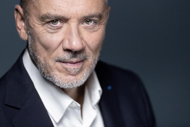 (FILES) Chief Executive and Chairman of the worldwide mobile phone network Orange Stephane Richard poses during a photo session in Paris on September 7, 2020. Stephane Richard, former CEO of the telecommunications group Orange, is set to become president of Olympique de Marseille, AFP learned on April 10, 2026 from a source familiar with the discussions, confirming a report in the regional daily La Provence. (Photo by JOEL SAGET / AFP)