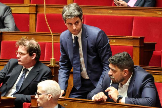 President of Ensemble Pour la Republique parliamentary group Gabriel Attal gestures during a debate at the National Assembly, French Parliament lower house, to discuss a proposed low aiming to authorise the work of employees of certain businesses on May 1st, in Paris on April 10, 2026. (Photo by Ludovic MARIN / AFP)