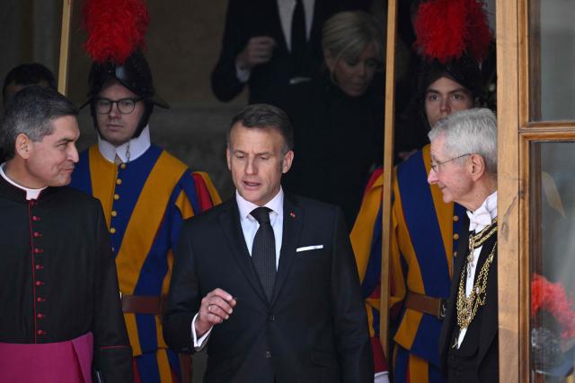 France's President Emmanuel Macron leaves the Vatican after a private audience with Pope Leo XIV, on April 10, 2026. (Photo by Tiziana FABI / AFP)