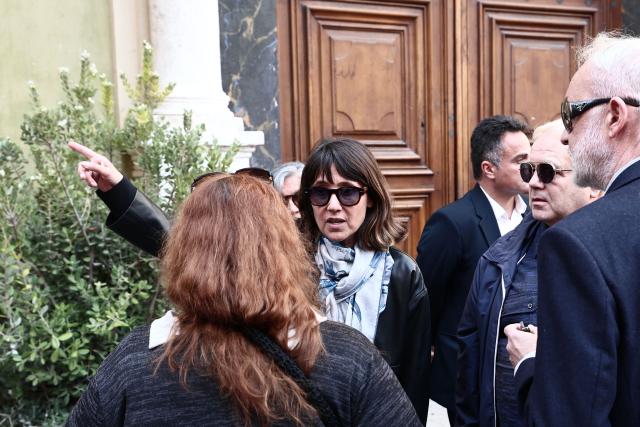 CEO of Banijay Entertainment Alexia Laroche-Joubert gestures after attending the funeral ceremony of Loana Petrucciani, the first reality TV star in France, at the cathedral of Sainte-Reparate in Nice, southeastern France where she was found dead at her home at the age of 48, on April 10, 2026. (Photo by Thibaud MORITZ / AFP)