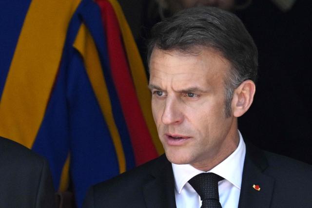 France's President Emmanuel Macron leaves the Vatican after a private audience with Pope Leo XIV, on April 10, 2026. (Photo by Tiziana FABI / AFP)