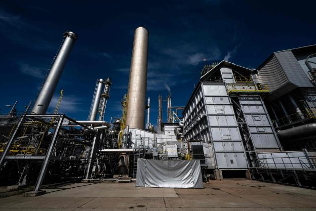 An outside view shows the ammonia production facility at the SKW Piesteritz agro-chemical plant in Piesteritz near Wittenberg, northern Germany, on April 9, 2026. SKW Piesteritz is Germany’s largest producer of ammonia and urea with an annual output of over four million tonnes, manufacturing both a wide range of industrial chemicals and agrochemical products. (Photo by John MACDOUGALL / AFP)