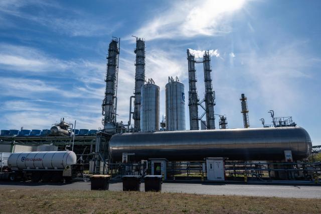 Liquid nitrogen is loaded into a container truck at the ammonia production facility at the SKW Piesteritz agro-chemical plant in Piesteritz near Wittenberg, northern Germany, on April 9, 2026. SKW Piesteritz is Germany’s largest producer of ammonia and urea with an annual output of over four million tonnes, manufacturing both a wide range of industrial chemicals and agrochemical products. (Photo by John MACDOUGALL / AFP)