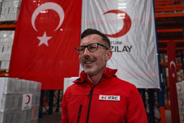 Scott Craig, IFRC spokesperson poses for AFP interview in Ankara on April 10, 2026, as The Red Cross and Turkey's Red Crescent plan to send supplies in Iran. The Red Cross and Turkey's Red Crescent on Friday dispatched an emergency humanitarian aid convoy from Turkey to Iran, as the organisation warned of a "desperate" humanitarian situation in the country. (Photo by Adem ALTAN / AFP)