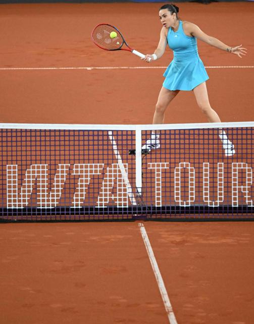 Romania's Elena-Gabriela Ruse returns the ball during her match against Latvia's Jelena Ostapenko (not pictured) on the day 5 of the women's singles match of the WTA-Upper Austria Linz tennis tournament in Linz, Austria, on April 10, 2026. (Photo by BARBARA GINDL / APA / AFP) / Austria OUT