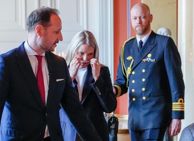 Crown Prince Haakon of Norway (L) and Crown Princess Mette-Marit of Norway attend a reception for the Norwegian athletes from the Paralympics in Milano Cortina 2026 at the Palace on April 10, 2026. (Photo by Lise Åserud / NTB / AFP) / Norway OUT