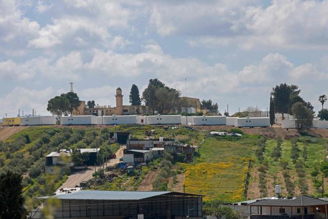 This photograph shows a view of the new mobile houses (caravans) in the settlement of Sa-Nur, south of Jenin, in the Israeli-occupied West Bank on April 10, 2026. Israel has occupied the West Bank since 1967, and violence there has soared since the Gaza war erupted in October 2023 following Hamas's attack on Israel. Some 3,200 Palestinians from dozens of Bedouin and herding communities have been forced from their homes by settler violence and movement restrictions since October 2023, the UN's humanitarian agency OCHA reported in October. All Israeli settlements in the West Bank are considered illegal by the international community. (Photo by Jaafar ASHTIYEH / AFP)