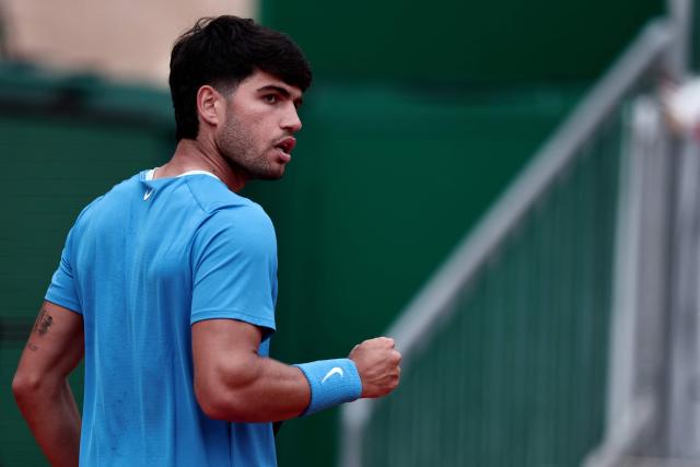 Spain's Carlos Alcaraz reacts after a point against Kazakhstan's Alexander Bublik during the Monte Carlo ATP Masters Series Tournament quarter final tennis match on Court Rainier III at the Monte-Carlo Country Club in Roquebrune-Cap-Martin, south-eastern France on April 10, 2026. (Photo by Thibaud MORITZ / AFP)