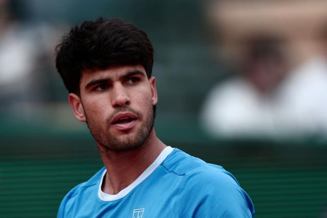 Spain's Carlos Alcaraz looks on as he plays against Kazakhstan's Alexander Bublik during the Monte Carlo ATP Masters Series Tournament quarter final tennis match on Court Rainier III at the Monte-Carlo Country Club in Roquebrune-Cap-Martin, south-eastern France on April 10, 2026. (Photo by Thibaud MORITZ / AFP)