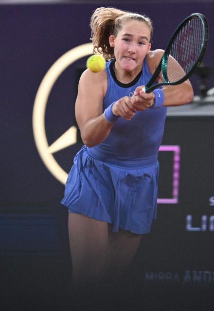 Mirra Andreeva returns the ball during her match against Romania's Sorana Cirstea (not pictured) on the day 5 of the women's singles match of the WTA-Upper Austria Ladies Linz tennis tournament in Linz, Austria, on April 10, 2026. (Photo by BARBARA GINDL / APA / AFP) / Austria OUT