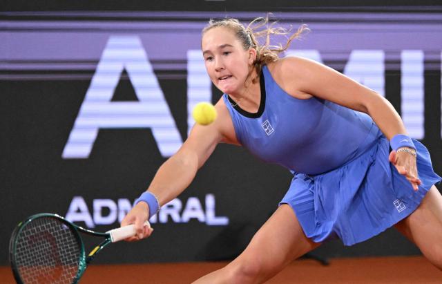 Mirra Andreeva returns the ball during her match against Romania's Sorana Cirstea (not pictured) on the day 5 of the women's singles match of the WTA-Upper Austria Ladies Linz tennis tournament in Linz, Austria, on April 10, 2026. (Photo by BARBARA GINDL / APA / AFP) / Austria OUT