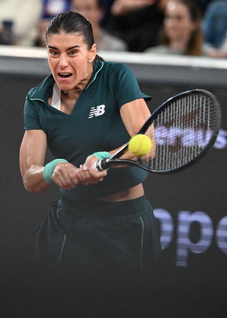 Romania's Sorana Cirstea returns the ball during her match against Mirra Andreeva (not pictured) on the day 5 of the women's singles match of the WTA-Upper Austria Ladies Linz tennis tournament in Linz, Austria, on April 10, 2026. (Photo by BARBARA GINDL / APA / AFP) / Austria OUT