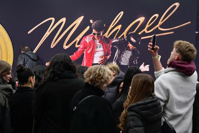 Fans wait fo guests to arrive on the red carptet for the world premiere of the Michael Jackson biopic "Michael" at the Uber Eats Music Hall in Berlin on April 10, 2026. Thousands of Michael Jackson fans converged on April 10, 2026 to Berlin before the world premiere of the biopic on the king of pop, despite the accusations of paedophilia that still target the artist. (Photo by John MACDOUGALL / AFP)