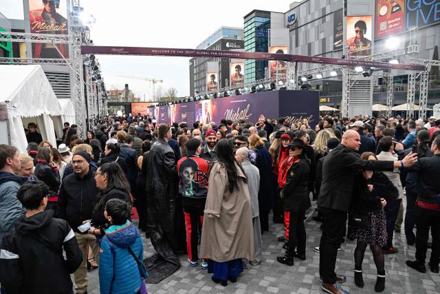 Fans wait for guests to arrive on the red carptet for the world premiere of the Michael Jackson biopic "Michael" at the Uber Eats Music Hall in Berlin on April 10, 2026. Thousands of Michael Jackson fans converged on April 10, 2026 to Berlin before the world premiere of the biopic on the king of pop, despite the accusations of paedophilia that still target the artist. (Photo by John MACDOUGALL / AFP)