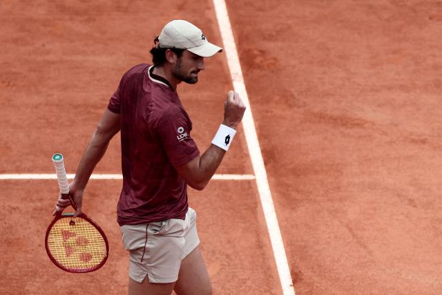 Monaco's Valentin Vacherot celebrates after a point against Australia's Alex De Minaur during the Monte Carlo ATP Masters Series Tournament quarter final tennis match on Court Rainier III at the Monte-Carlo Country Club in Roquebrune-Cap-Martin, south-eastern France on April 10, 2026. (Photo by Thibaud MORITZ / AFP)