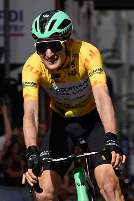 Team Decathlon CMA CGM's French rider Paul Seixas crosses the finish line to win the fifth stage of the Basque Country's Itzulia cycling tour, a 176.2 km race starting and finishing in Eibar, on April 10, 2026. (Photo by ANDER GILLENEA / AFP)
