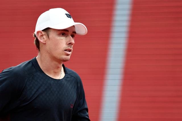 Australia's Alex De Minaur looks on as he plays against Monaco's Valentin Vacherot during the Monte Carlo ATP Masters Series Tournament quarter final tennis match on Court Rainier III at the Monte-Carlo Country Club in Roquebrune-Cap-Martin, south-eastern France on April 10, 2026. (Photo by Thibaud MORITZ / AFP)