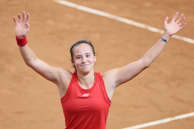 Belgium's Hanne Vandewinkel celebrates after defeating USA's Iva Jovic during their women's singles match of the Billie Jean King Cup play-offs between Belgium and USA in Ostend on April 10, 2026. (Photo by BENOIT DOPPAGNE / Belga / AFP) / Belgium OUT