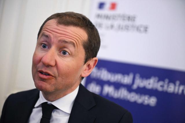 Mulhouse Public Prosecutor Nicolas Heitz speaks to the press after a boy was discovered naked and malnourished on a pile of rubbish in a van where he had been kept locked up, in Hagenbach, eastern France, on April 10, 2026. Gendarmes discovered the child on April 6, 2026, after being alerted by a local resident who had heard “the sounds of a child” coming from a van parked in a resident's courtyard. The nine-year-old endured a nightmare for over a year in the small village of southern Alsace, according to the public prosecutor in Mulhouse, who announced on April 10 that the boy’s father and his partner had been charged. (Photo by SEBASTIEN BOZON / AFP)