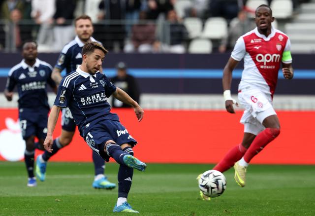 Paris FC's French midfielder #21 Maxime Lopez kicks the ball during the French L1 football match between Paris FC and AS Monaco at the Stade Jean-Bouin in Paris on April 10, 2026. (Photo by FRANCK FIFE / AFP)