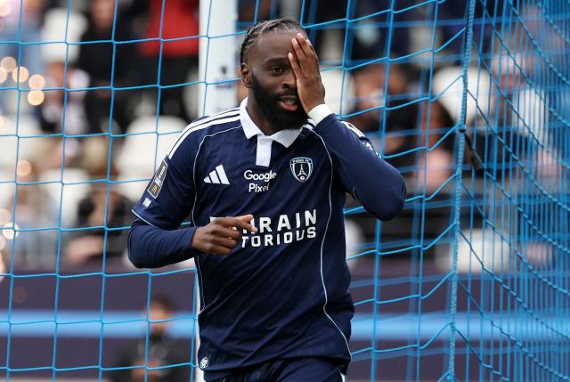 Paris FC's French midfielder #93 Jonathan Ikone (R) celebrates after scoring his second goal during the French L1 football match between Paris FC and AS Monaco at the Stade Jean-Bouin in Paris on April 10, 2026. (Photo by FRANCK FIFE / AFP)