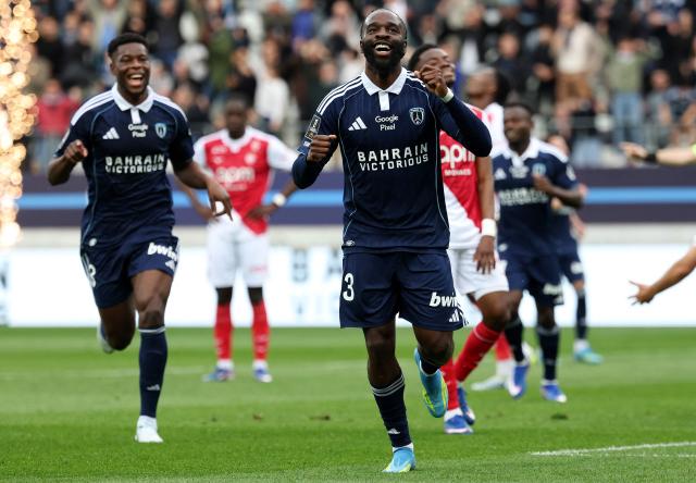 Paris FC's French midfielder #93 Jonathan Ikone (C) celebrates after scoring his second goal during the French L1 football match between Paris FC and AS Monaco at the Stade Jean-Bouin in Paris on April 10, 2026. (Photo by FRANCK FIFE / AFP)