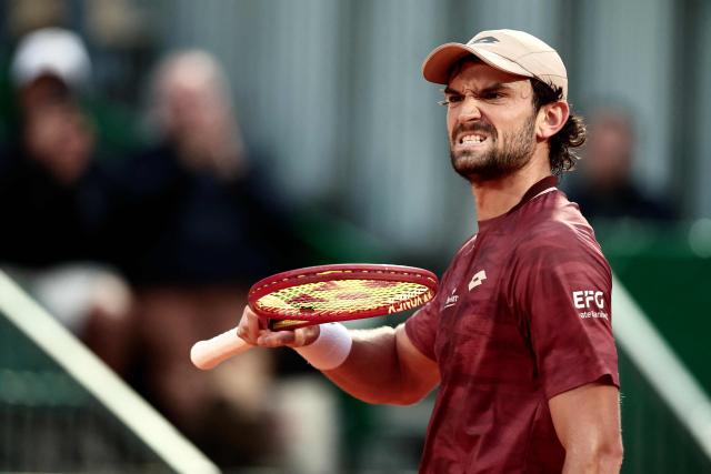 Monaco's Valentin Vacherot reacts as he plays against Australia's Alex De Minaur during the Monte Carlo ATP Masters Series Tournament quarter final tennis match on Court Rainier III at the Monte-Carlo Country Club in Roquebrune-Cap-Martin, south-eastern France on April 10, 2026. (Photo by Thibaud MORITZ / AFP)