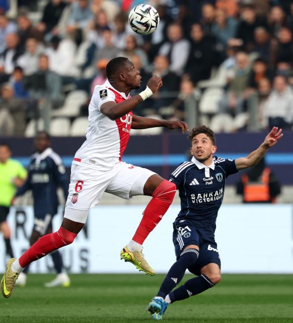 Monaco's Swiss midfielder #06 Denis Zakaria (L) heads the ball next to Paris FC's French midfielder #21 Maxime Lopez during the French L1 football match between Paris FC and AS Monaco at the Stade Jean-Bouin in Paris on April 10, 2026. (Photo by FRANCK FIFE / AFP)