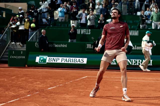Monaco's Valentin Vacherot celebrates after winning against Australia's Alex De Minaur during the Monte Carlo ATP Masters Series Tournament quarter final tennis match on Court Rainier III at the Monte-Carlo Country Club in Roquebrune-Cap-Martin, south-eastern France on April 10, 2026. (Photo by Thibaud MORITZ / AFP)