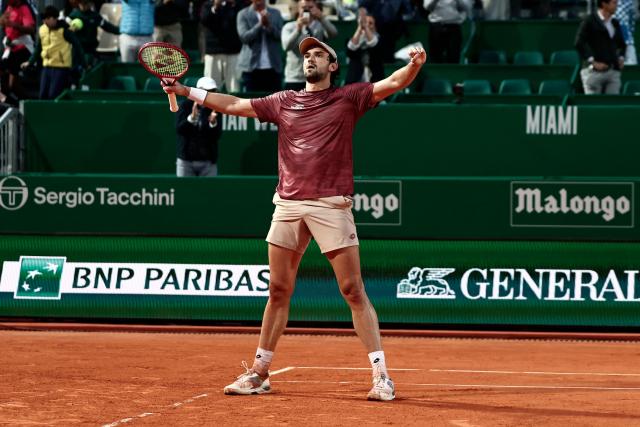 TOPSHOT - Monaco's Valentin Vacherot celebrates after winning against Australia's Alex De Minaur during the Monte Carlo ATP Masters Series Tournament quarter final tennis match on Court Rainier III at the Monte-Carlo Country Club in Roquebrune-Cap-Martin, south-eastern France on April 10, 2026. (Photo by Thibaud MORITZ / AFP)