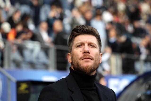 Monaco's Belgian head coach Sebastien Pocognoli looks on during the French L1 football match between Paris FC and AS Monaco at the Stade Jean-Bouin in Paris on April 10, 2026. (Photo by FRANCK FIFE / AFP)