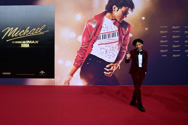 US young actor Juliano Valdi poses for photogaphers as he arrives on the red carpet for the world premiere of the Michael Jackson biopic "Michael" at the Uber Eats Music Hall in Berlin on April 10, 2026. Thousands of Michael Jackson fans converged on April 10, 2026 to Berlin before the world premiere of the biopic on the king of pop, despite the accusations of paedophilia that still target the artist. (Photo by John MACDOUGALL / AFP)
