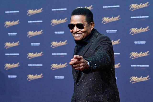 US singer Jackie Jackson poses for photogaphers as he arrives on the red carpet for the world premiere of the Michael Jackson biopic "Michael" at the Uber Eats Music Hall in Berlin on April 10, 2026. Thousands of Michael Jackson fans converged on April 10, 2026 to Berlin before the world premiere of the biopic on the king of pop, despite the accusations of paedophilia that still target the artist. (Photo by John MACDOUGALL / AFP)