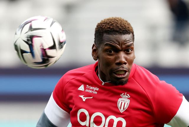 Monaco's French midfielder #08 Paul Pogba warms up ahead of the French L1 football match between Paris FC and AS Monaco at the Stade Jean-Bouin in Paris on April 10, 2026. (Photo by FRANCK FIFE / AFP)