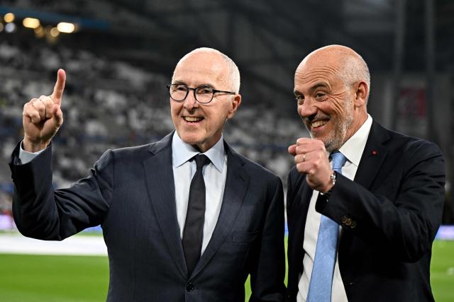 Marseille's newly appointed President Stephane Richard (R) and Marseille's US owner Frank McCourt pose prior the French L1 football match between Olympique de Marseille (OM) and FC Metz at the Stade Velodrome in Marseille, southern France, on April 10, 2026. (Photo by Gabriel BOUYS / AFP)